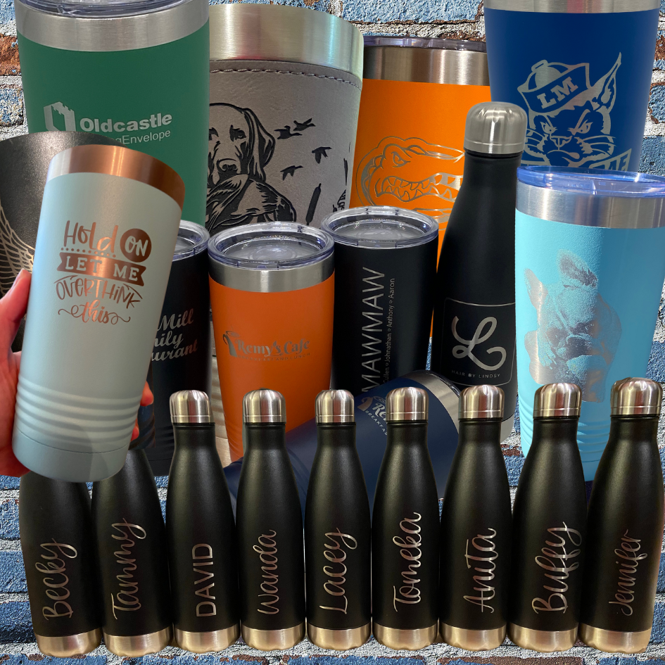 Image shows tumblers that have been engraved with different designs.