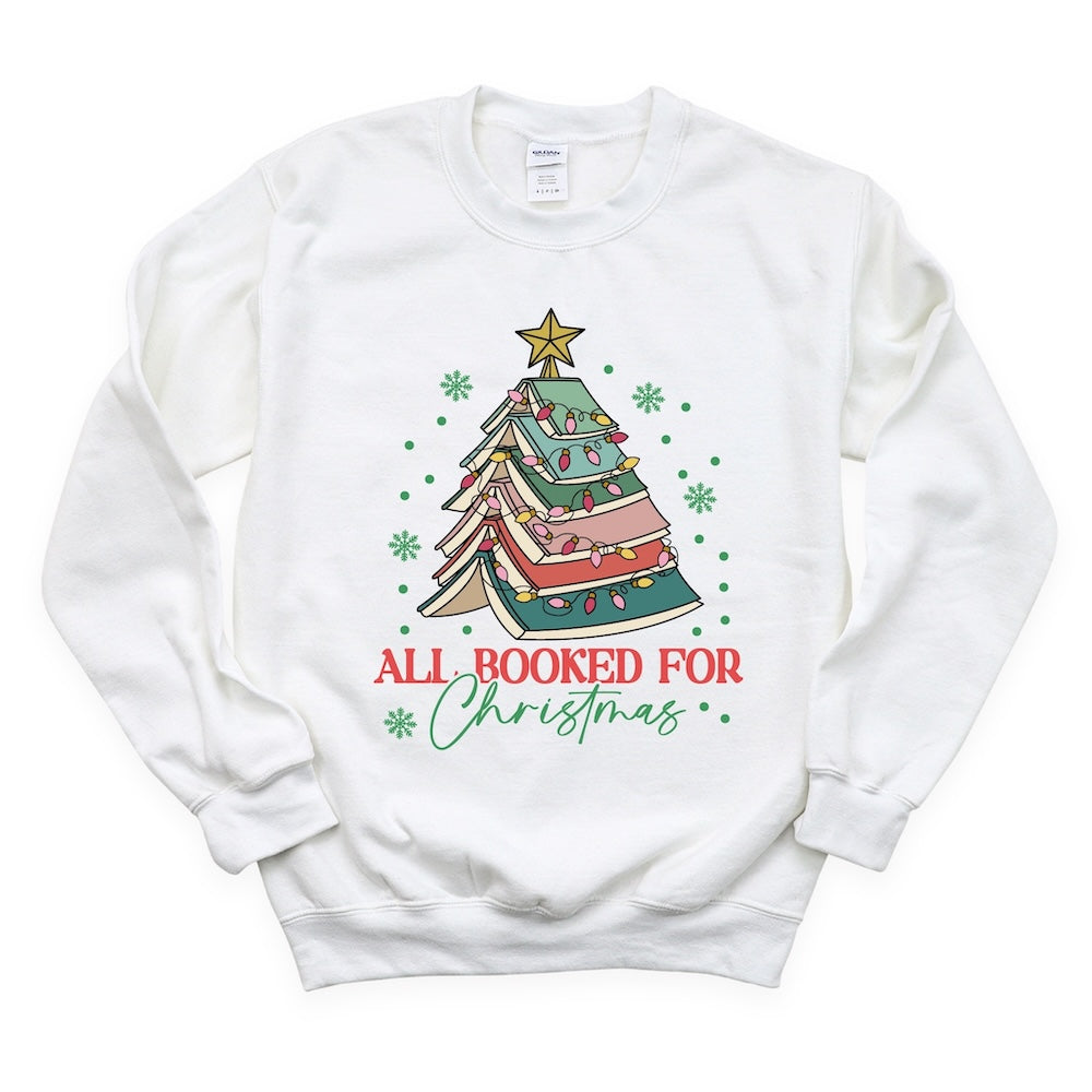 Image shows a DTF transfer printed on a sweatshirt that shows a Christmas Tree made of books. 